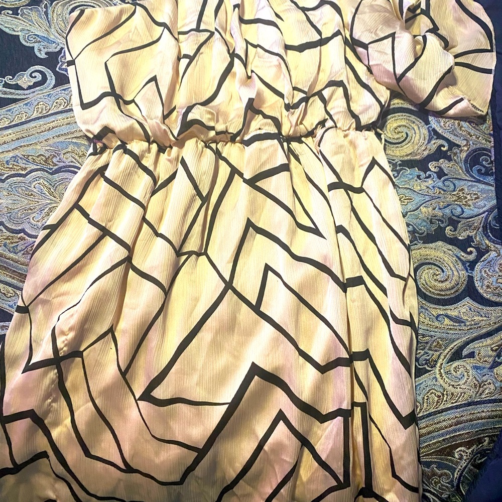I have two one shoulder dresses. Knee length.